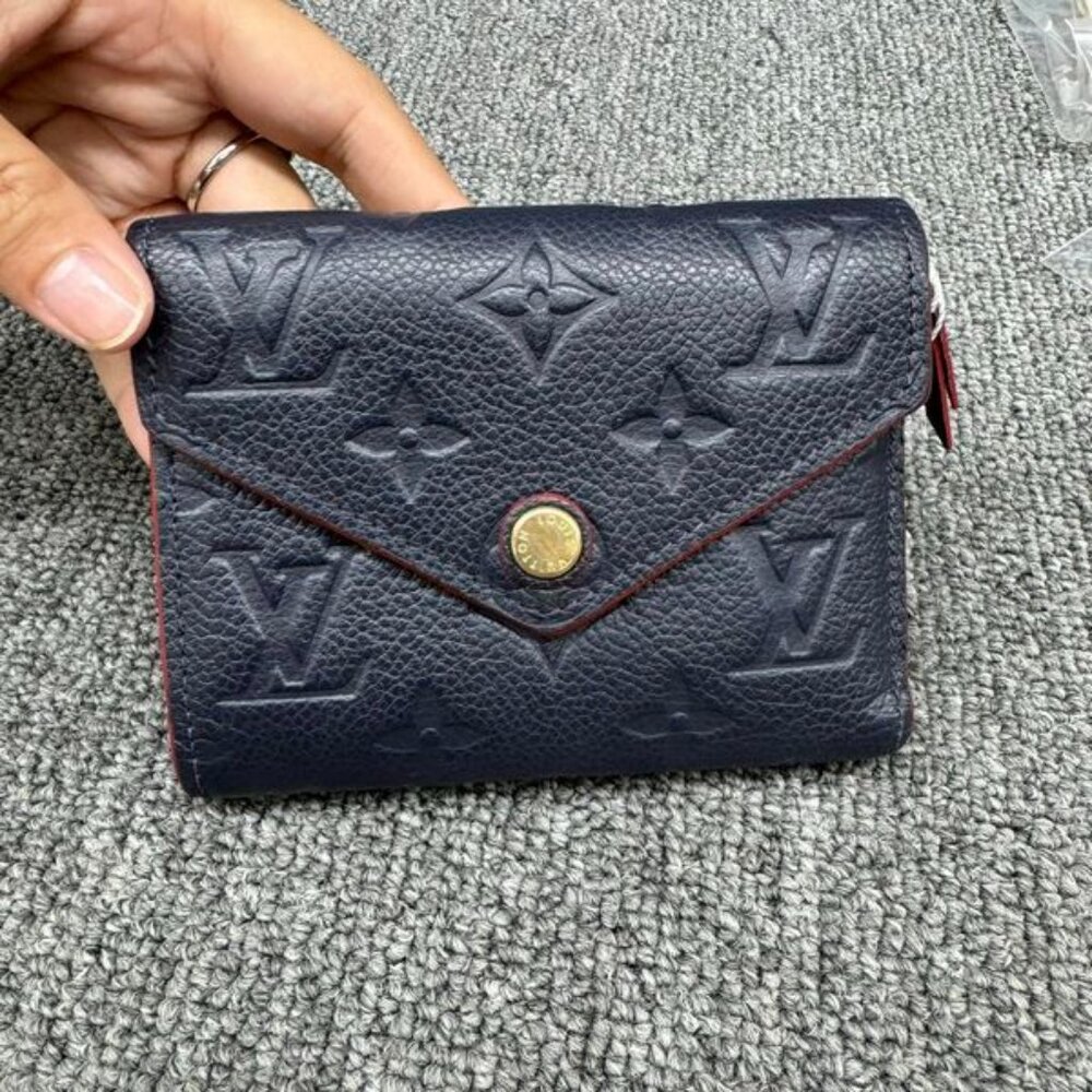 Authentic Louis Vuitton Victorine Navy Monogram Leather Wallet - Picture 1 of 15